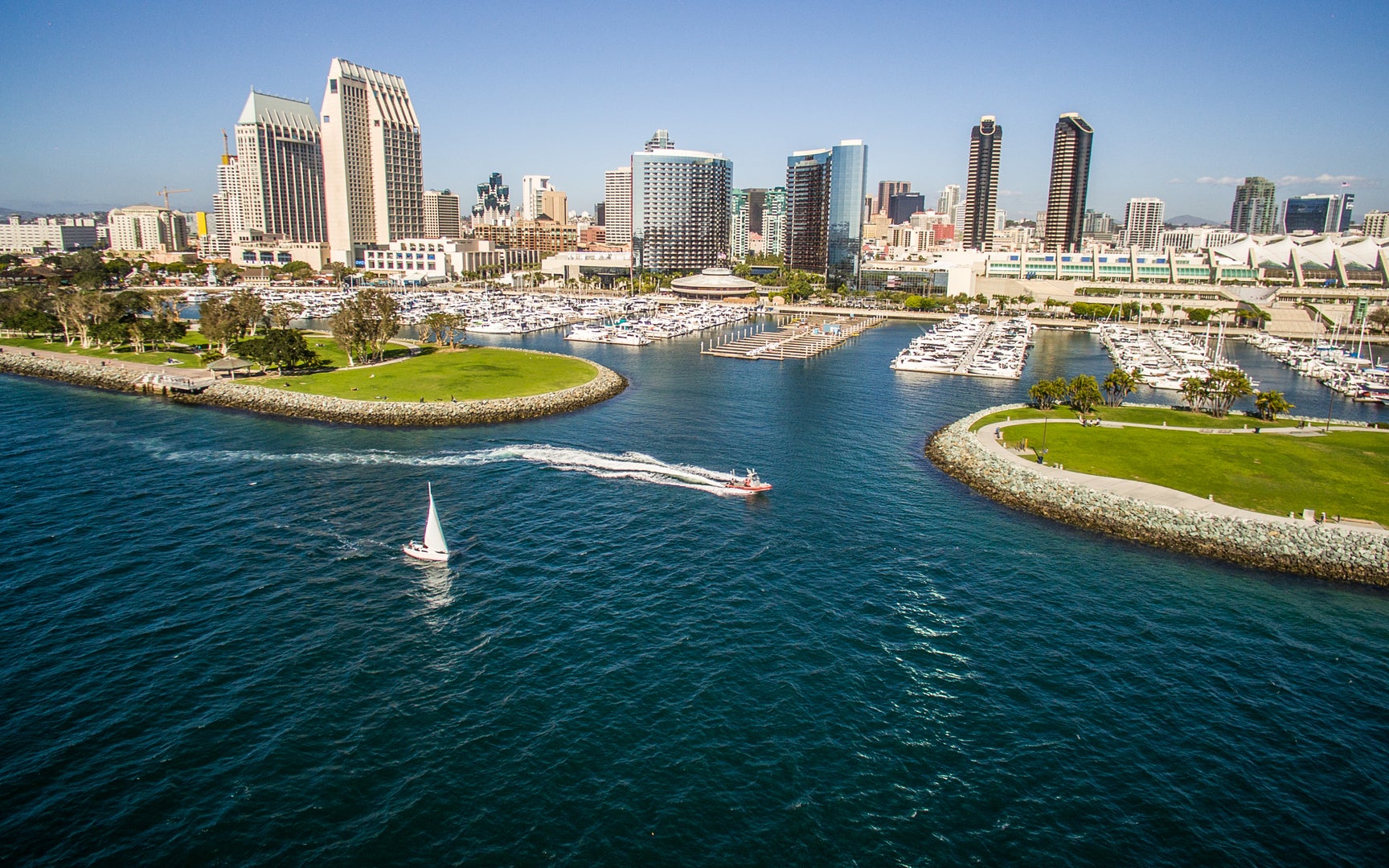 Aerial view of boats and downtown San Diego harbor.