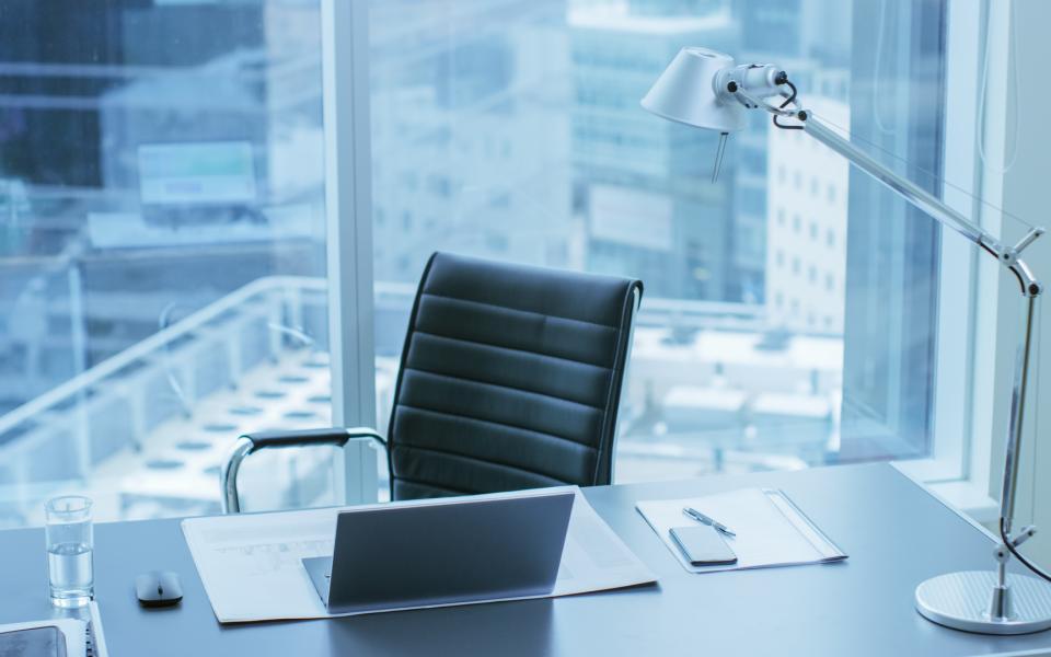 High angle shot of an executive's working desk and chair.